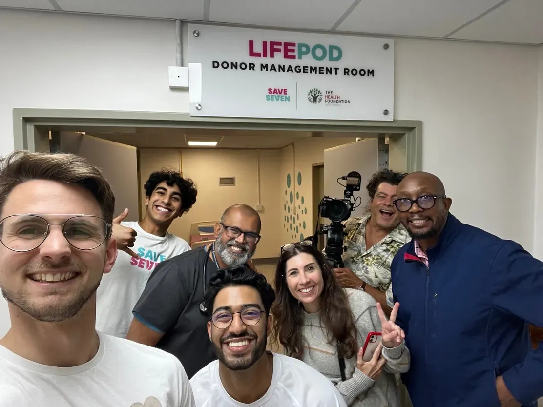 The team taking a selfie below the LifePod Donor Management Room sign