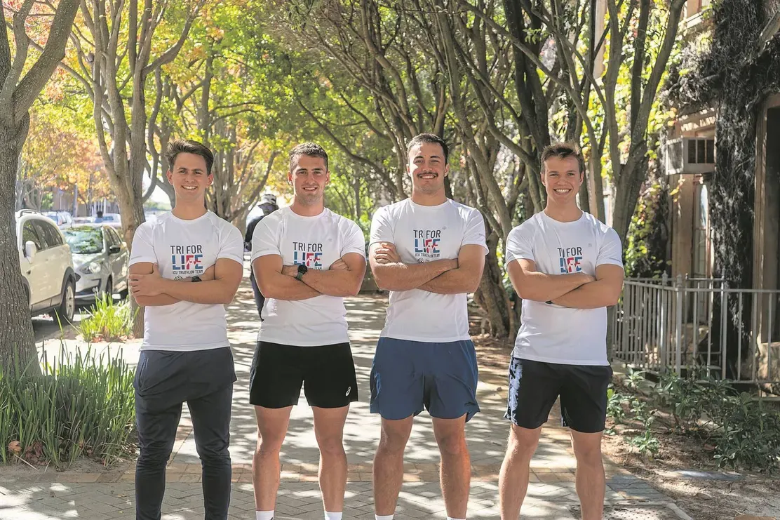 Four Save7 athletes in Tri for Life T-shirts